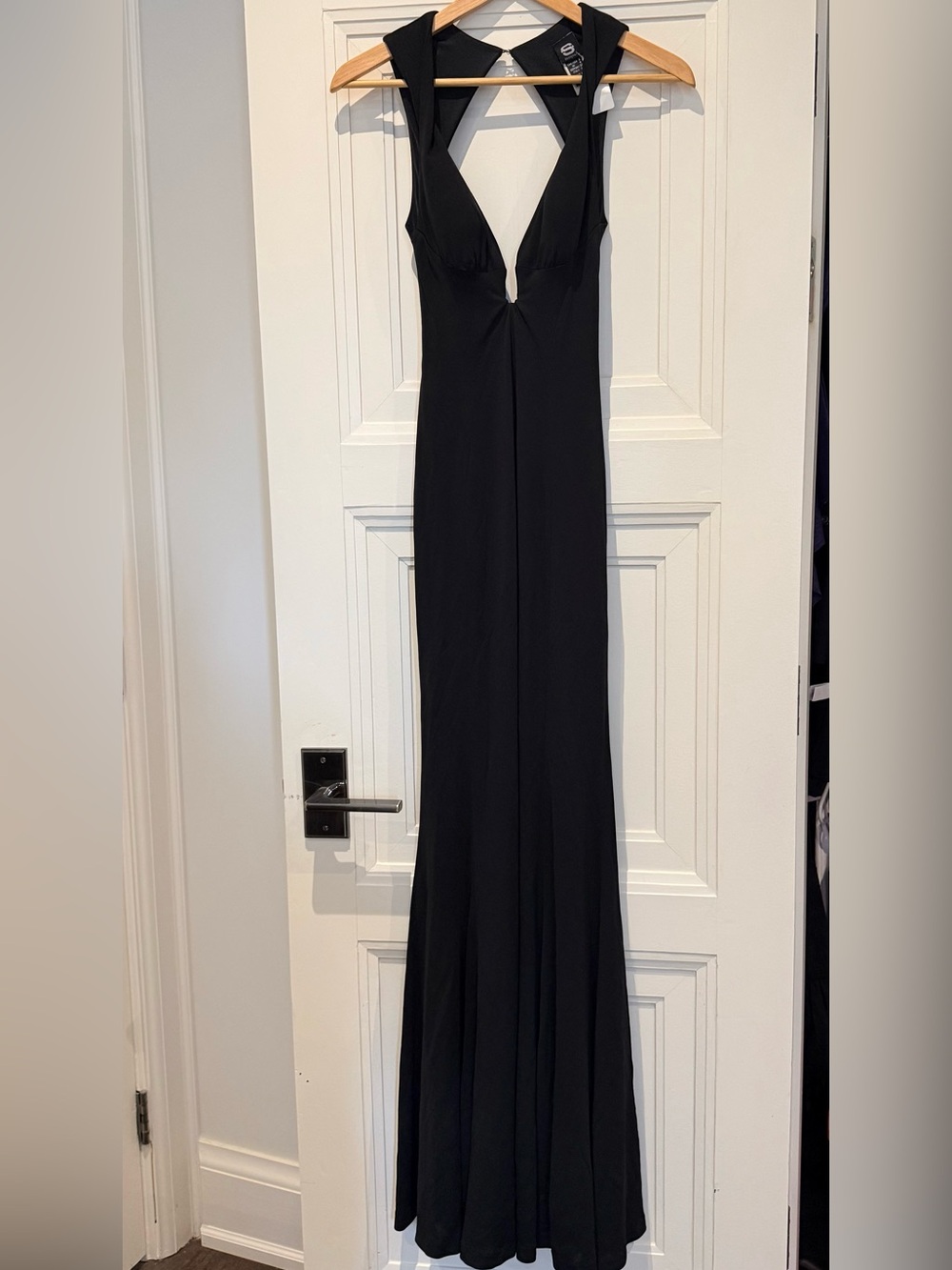 Sleek Black Maxi Dress with Plunging V-Neck and open back